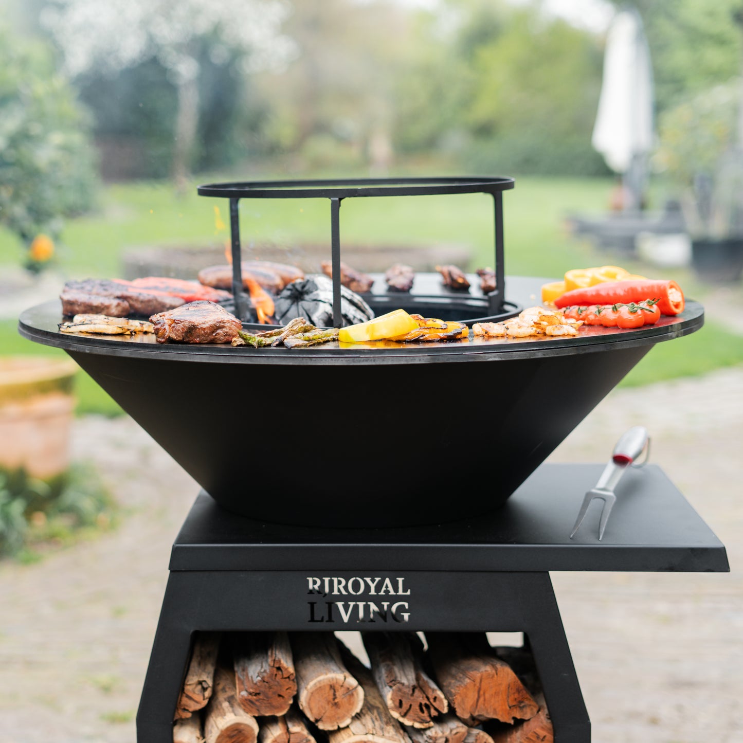BBQ Plancha Grill Compañero XXL Blackline 2.0 - Con attizzatoio e porta legna Ø80cm