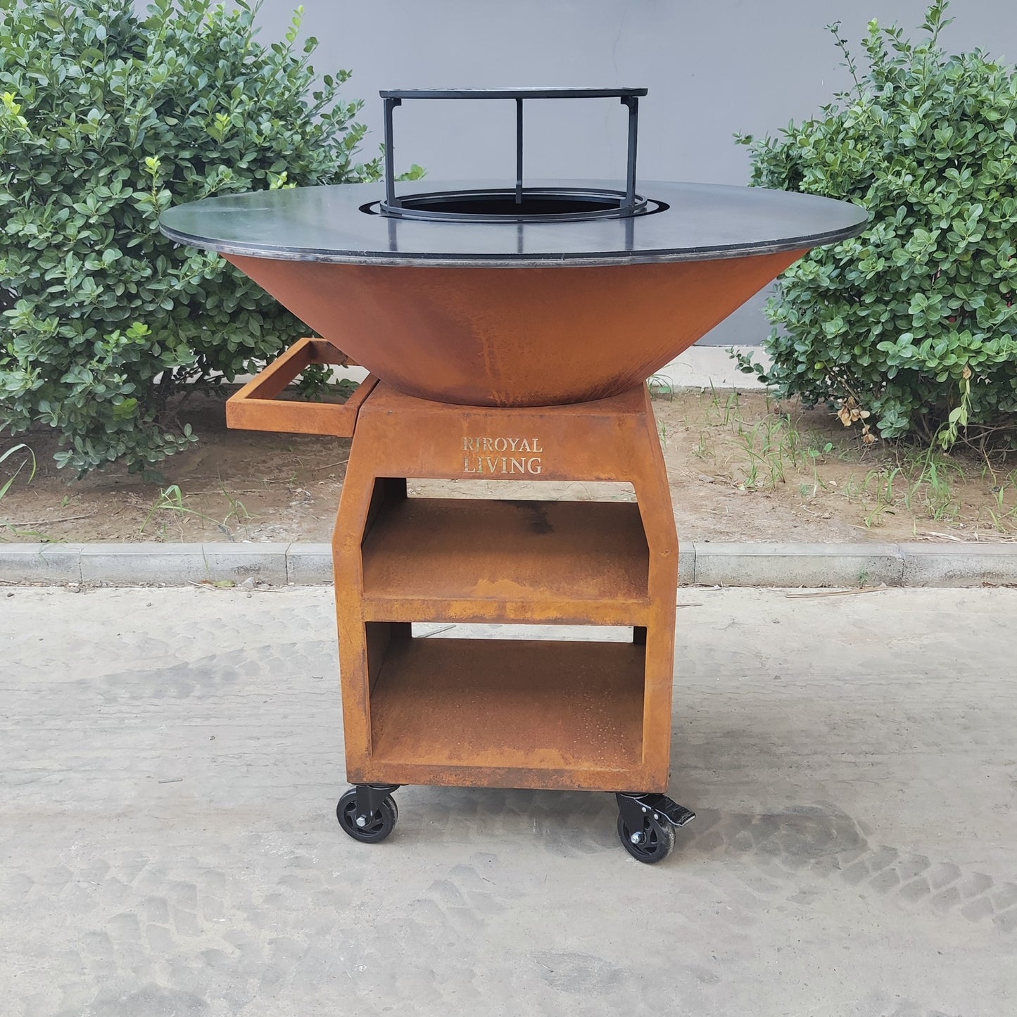 BBQ Plancha Grill Maestro XXXL Ø100cm Acciaio Corten - Con ruote grandi e contenitore per la legna