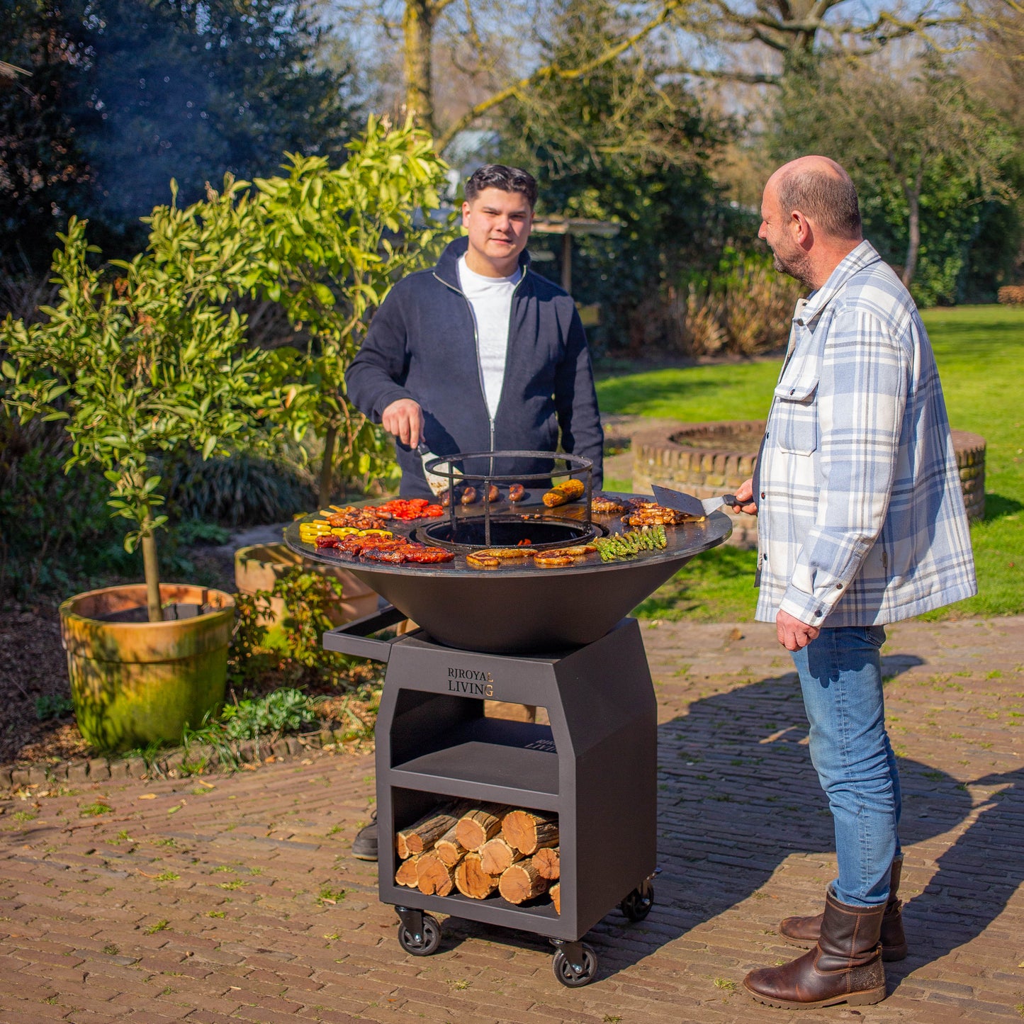 BBQ Plancha Grill Maestro XXXL Ø100cm Acciaio Corten - Con ruote grandi e contenitore per la legna