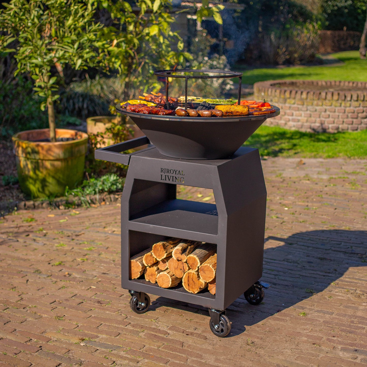 Griglia Plancha BBQ Maestro Ø70 cm Blackline - Con ruote grandi e vano porta legna