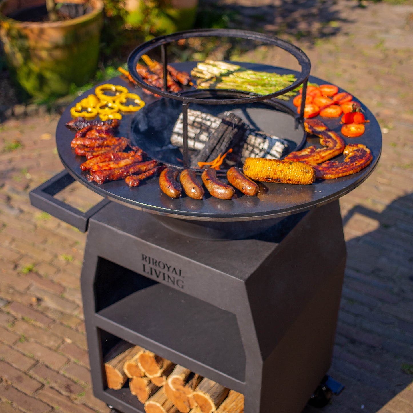 Griglia Plancha BBQ Maestro Ø70 cm Blackline - Con ruote grandi e vano porta legna