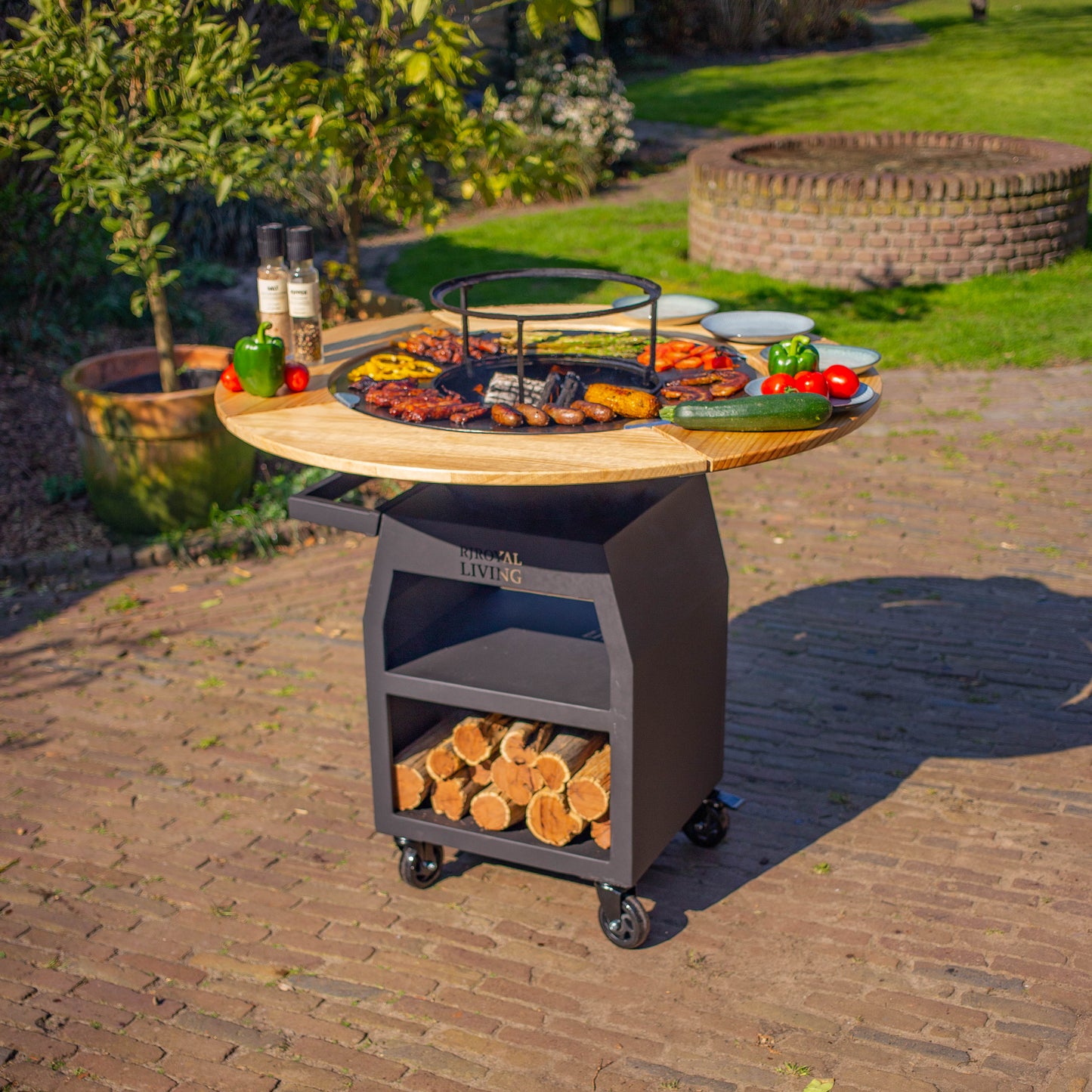 BBQ Plancha Grill Maestro XXXL Ø70cm Acciaio verniciato a polvere nero - Con ruote grandi e contenitore per la legna