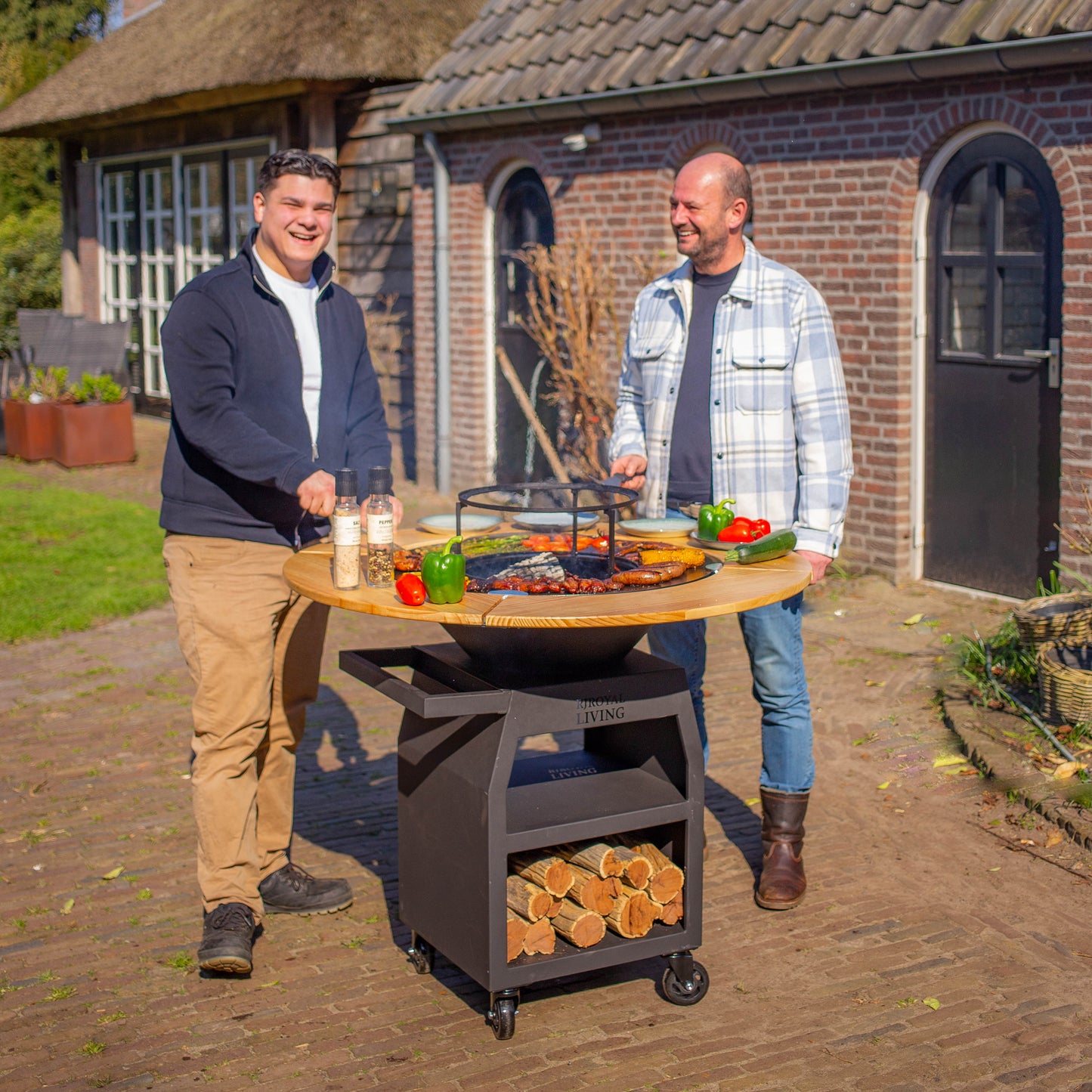 BBQ Plancha Grill Maestro XXXL Ø70cm Acciaio verniciato a polvere nero - Con ruote grandi e contenitore per la legna