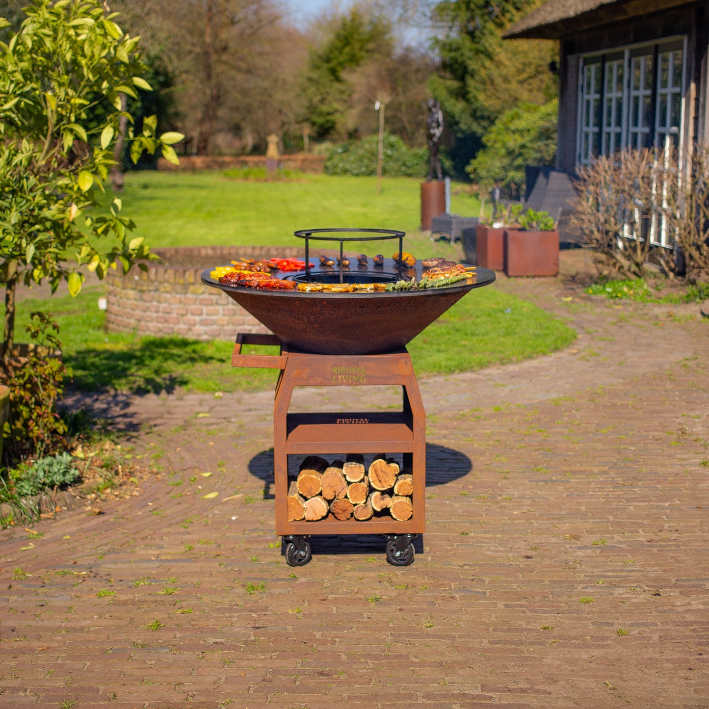 BBQ Plancha Grill Maestro XXXL Ø100cm Acciaio Corten - Con ruote grandi e contenitore per la legna