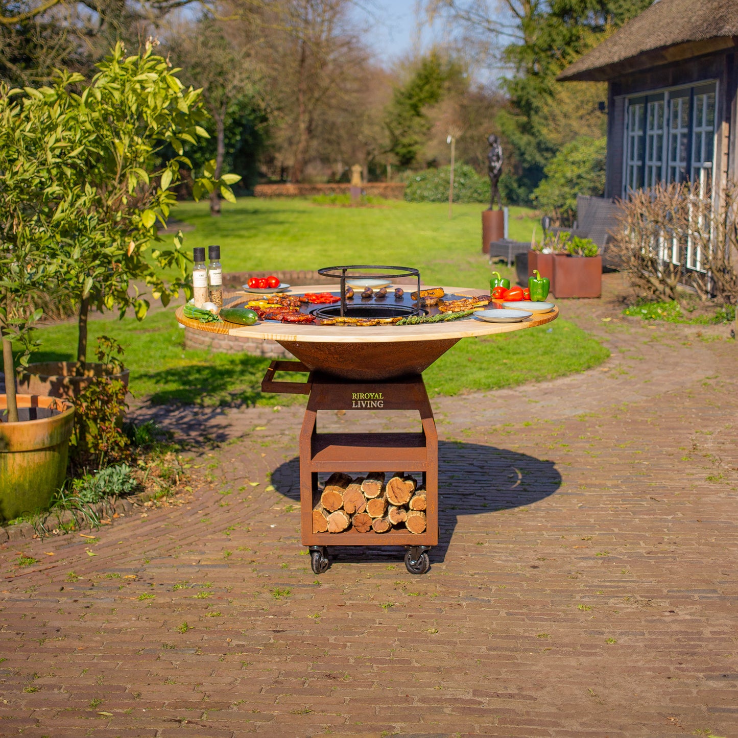 BBQ Plancha Grill Maestro XXXL Ø100cm Acciaio Corten - Con ruote grandi e contenitore per la legna