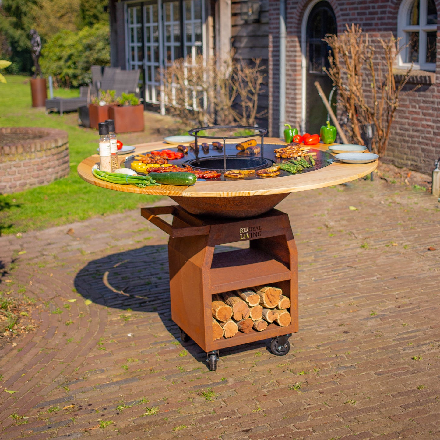 BBQ Plancha Grill Maestro XXXL Ø100cm Acciaio Corten - Con ruote grandi e contenitore per la legna