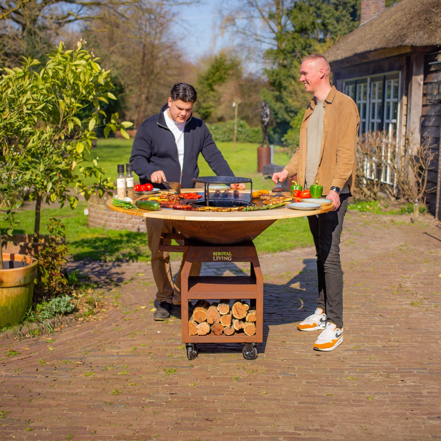 BBQ Plancha Grill Maestro XXXL Ø100cm Acciaio Corten - Con ruote grandi e contenitore per la legna