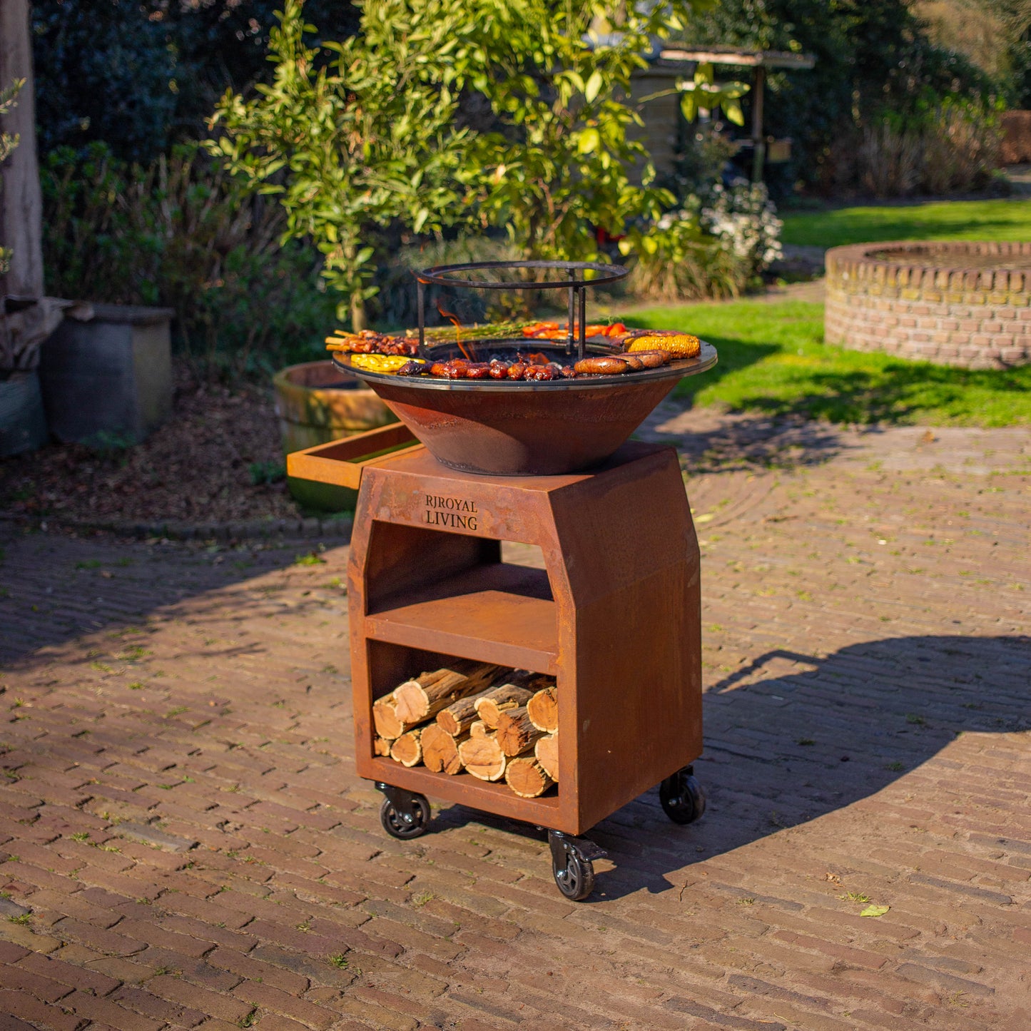 BBQ Plancha Grill Maestro XXXL Ø70cm Acciaio Corten - Con ruote grandi e contenitore per la legna