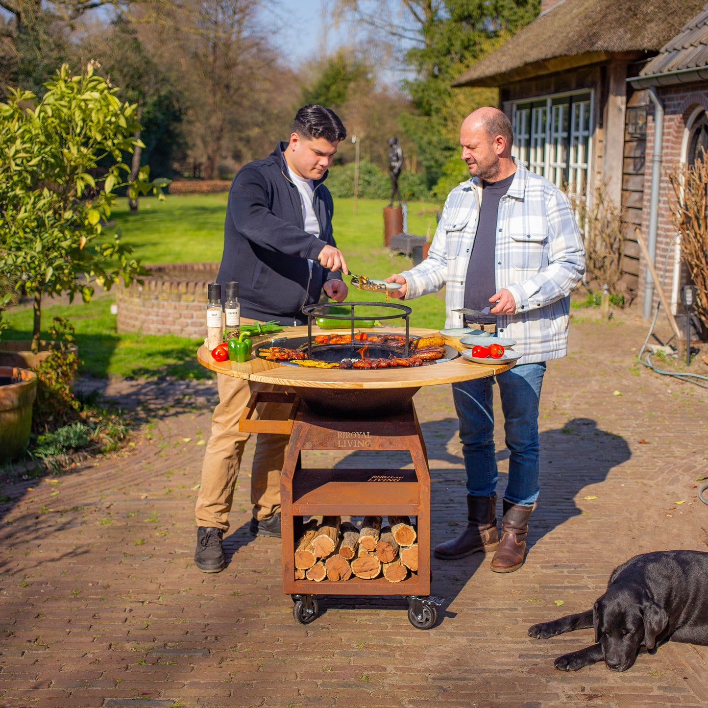 BBQ Plancha Grill Maestro XXXL Ø70cm Acciaio Corten - Con ruote grandi e contenitore per la legna