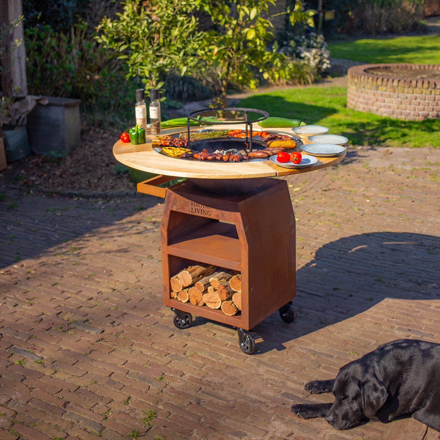 BBQ Plancha Grill Maestro XXXL Ø70cm Acciaio Corten - Con ruote grandi e contenitore per la legna