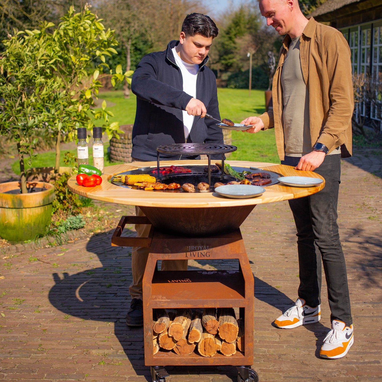 BBQ Plancha Grill Maestro XXXL Ø100cm Acciaio Corten - Con ruote grandi e contenitore per la legna