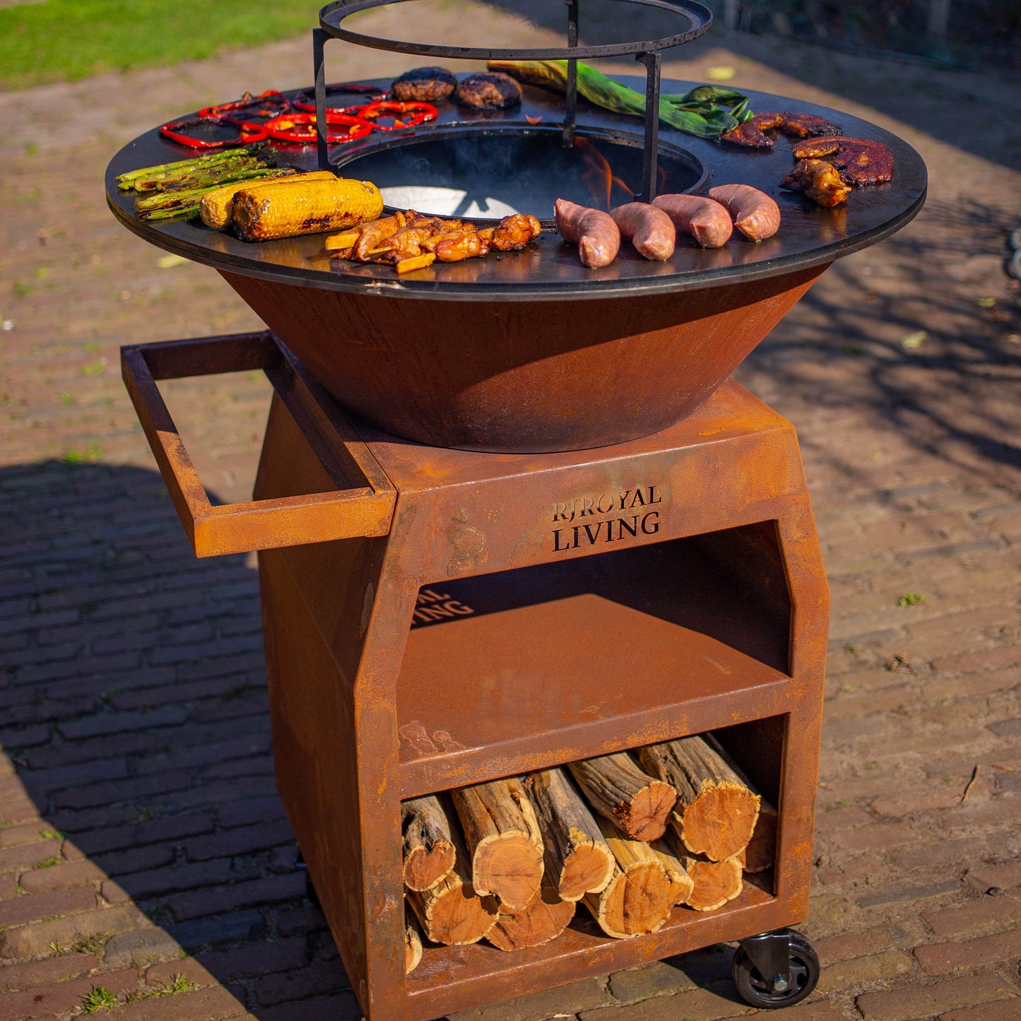 BBQ Plancha Grill Maestro XXXL Ø80cm Acciaio Corten - Con ruote grandi e contenitore per la legna